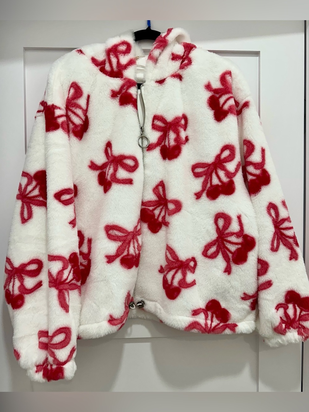 Fuzzy jacket with bows